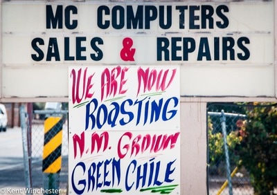 Computers roasting green chile sign.